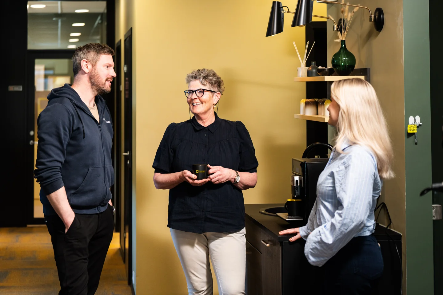 Glassfiber Produkter employees talking in the office